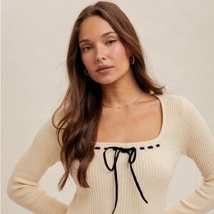 Cream Sweater with Black Bow Accent